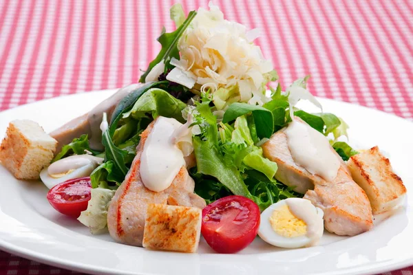 Warm salad with chicken meat