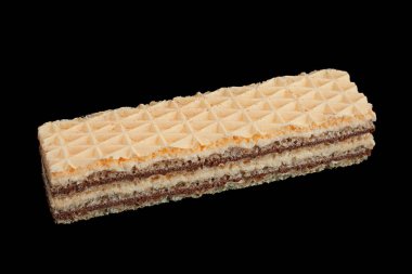 Siyah arkaplanda izole edilmiş beyaz gofret yakın plan