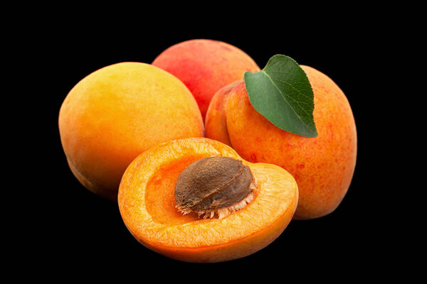 Apricot fruit closeup isolated on black background