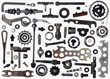 Old bicycle parts and tools in bike workshop