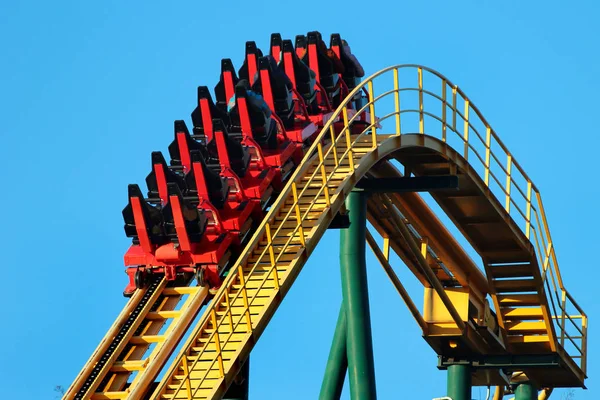 Roller coaster against blue sky background. — Stok fotoğraf