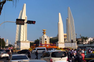 Bangkok, Thailand - December 13, 2019: Democracy Monument in central Bangkok, on a traffic circle on the wide east-west Ratchadamnoen Avenue.