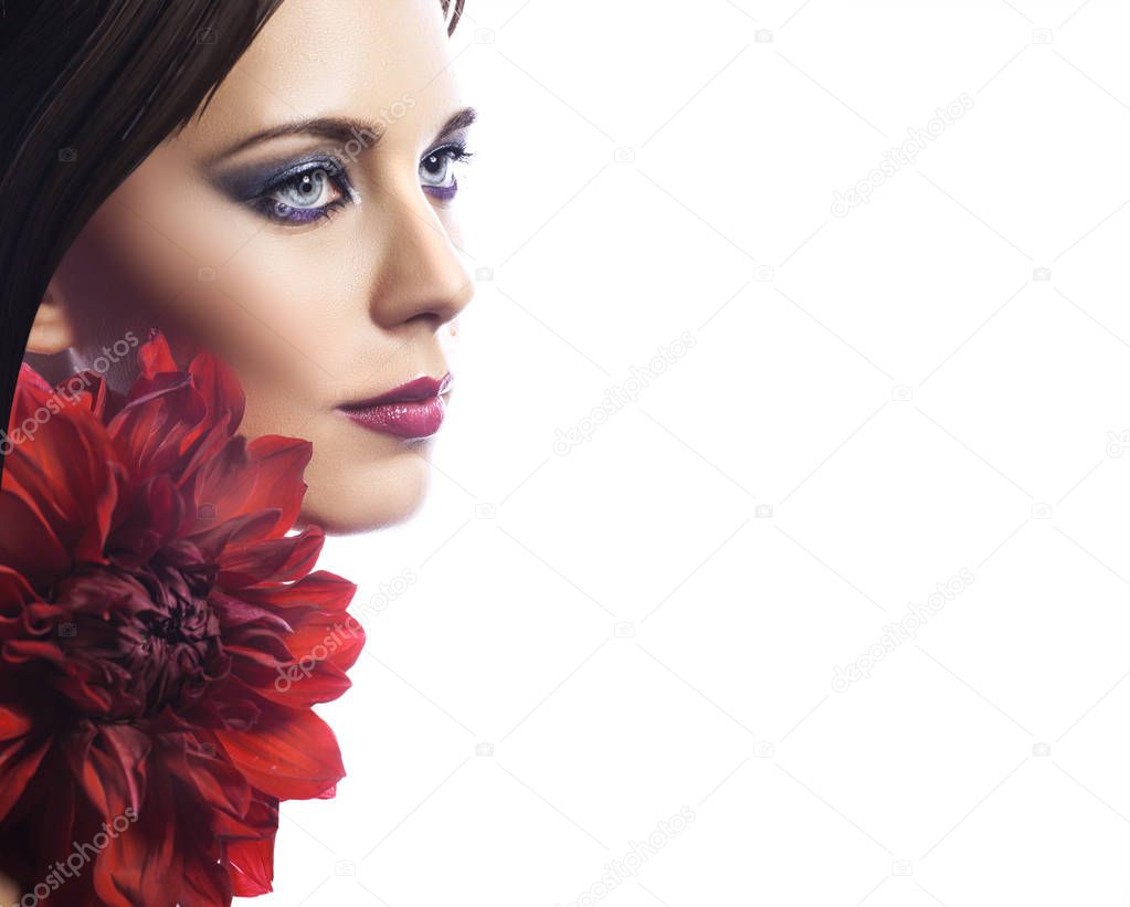 Beauty woman with bunch flowers. Professional Make up and hairstyle