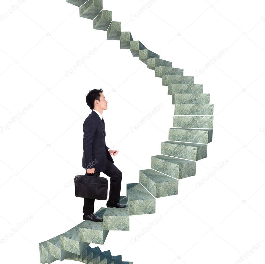 business man going upstairs in a curved staircase to success