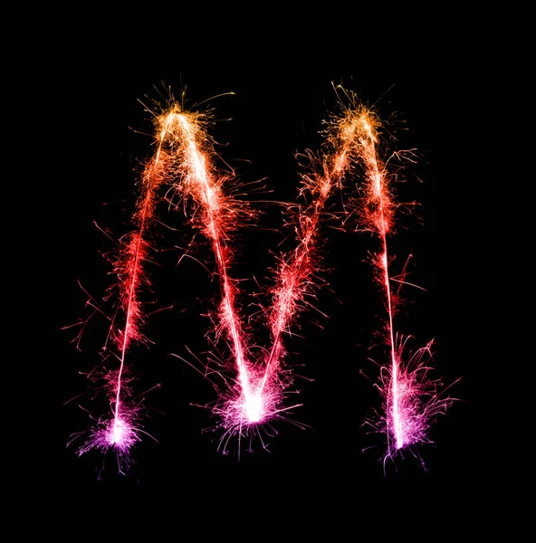 Sparkler firework light alphabet M (Capital Letters) at night — Stock Photo, Image