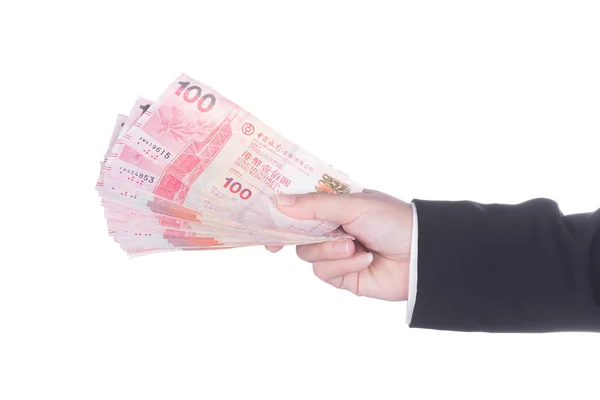 Hong Kong Doları para üzerinde beyaz izole ile takım elbiseli el — Stok fotoğraf