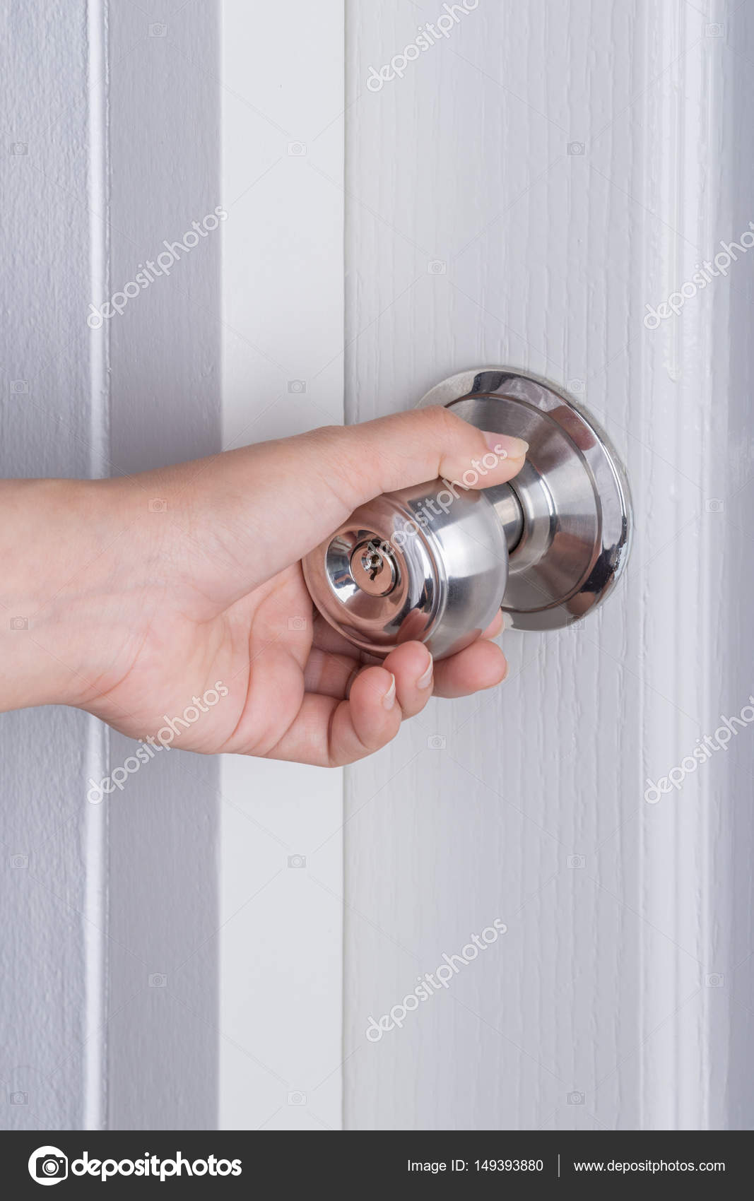 Hand Opening Door Knob On White Door Stock Photo C Geargodz