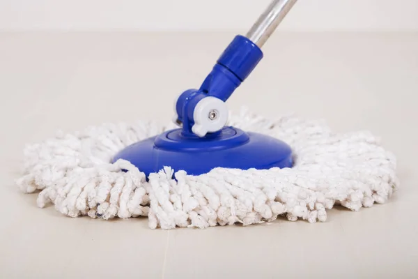 Mop for cleaning with floor background — Stock Photo, Image