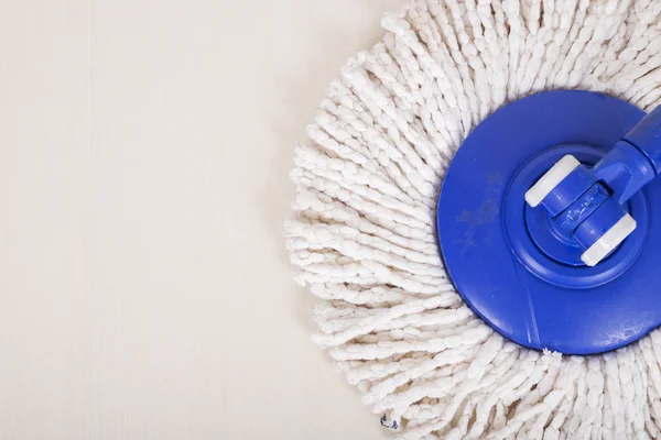 Mop for cleaning with floor background — Stock Photo, Image