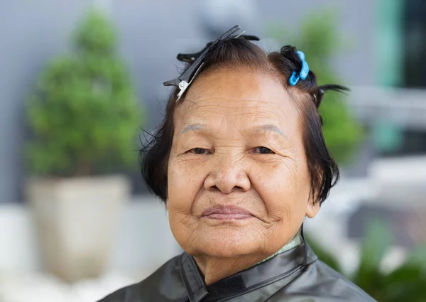 Senior woman with hairpin — Stock Photo, Image