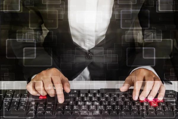 Hands typing on computer keyboard — Stock Photo, Image