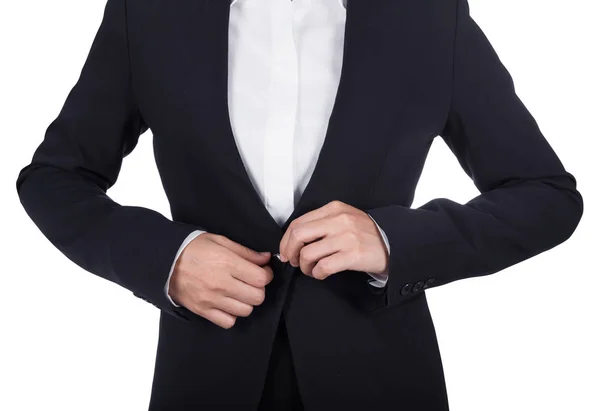 Business woman buttoning her suit isolated on white — Stock Photo, Image