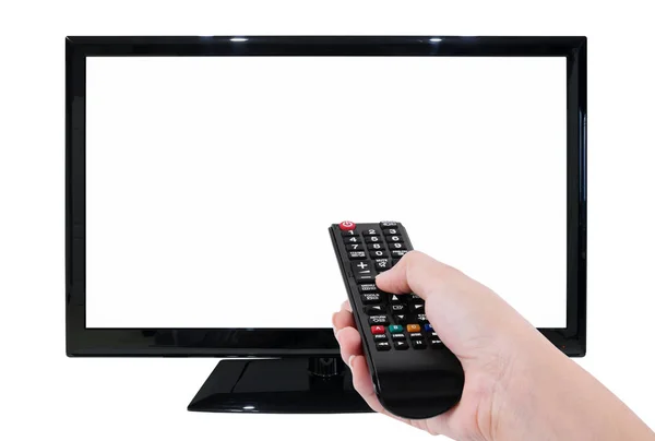 Mano que sostiene la TV a distancia con TV led y pantalla en blanco aislada en — Foto de Stock