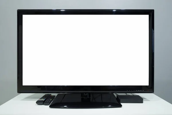 LED TV with blank screen on stand — Stock Photo, Image