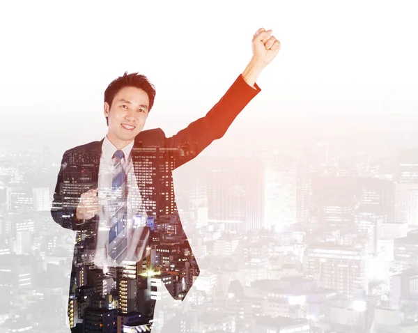 Double exposure of success businessman keeping arms raised with — Stock Photo, Image