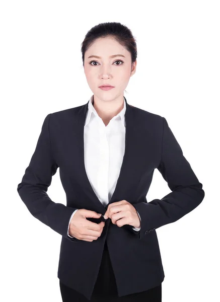 Mujer de negocios abotonando su traje aislado en blanco —  Fotos de Stock