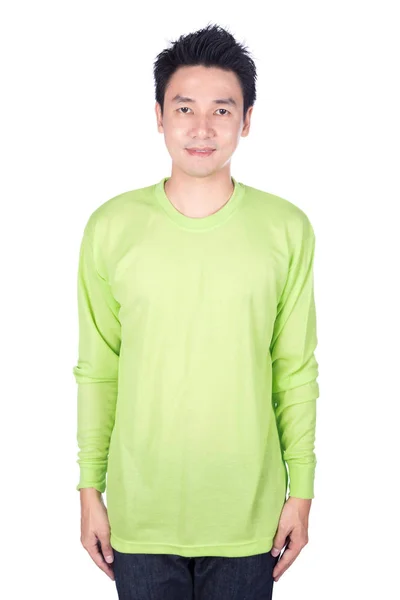 Man in groen t-shirt met lange mouwen geïsoleerd op een witte achtergrond — Stockfoto