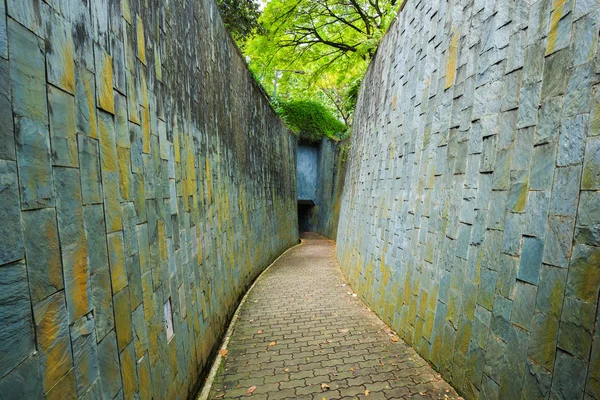 Stone walk way in tunnel at Fort Canning Park, Singapore — Stock Photo, Image