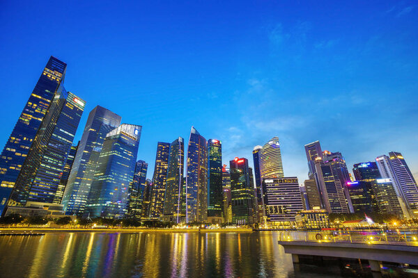 View of central business district building of Singapore city at twilight time