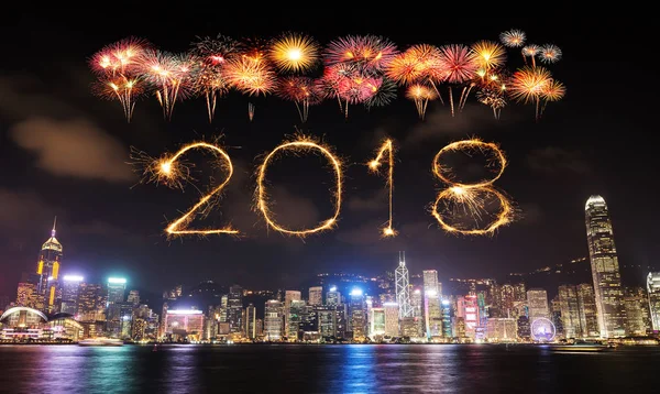 2018 Happy new year firework Sparkle with Hong Kong cityscape