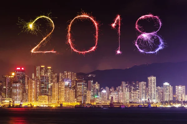 2018 Happy new year firework Sparkle with Hong Kong cityscape