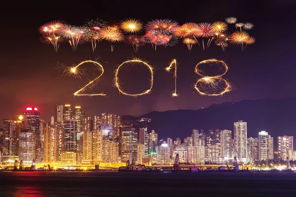 2018 Happy new year firework Sparkle with Hong Kong cityscape