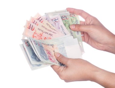 Singapur banknot dolar (Sgd) üzerinde beyaz ba izole el