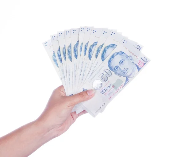 Mano con billetes de Singapur dólares (50 SGD) aislados en blanco — Foto de Stock