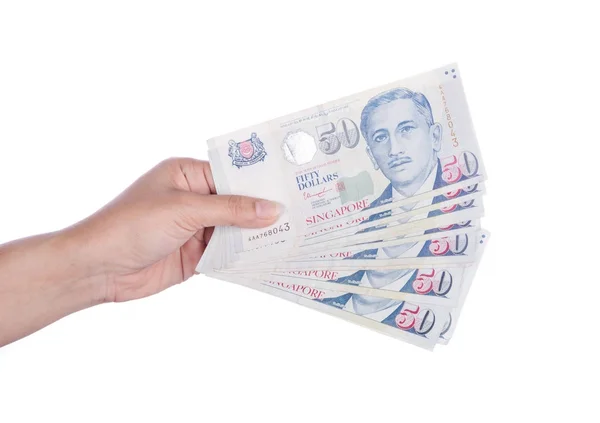 Hand with Singapore banknotes dollars (50 SGD) isolated on white — Stock Photo, Image