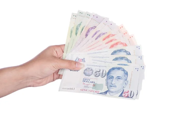 Ręka z Singapuru Banknoty dolarów (Sgd) na białym tle na biały ba — Zdjęcie stockowe