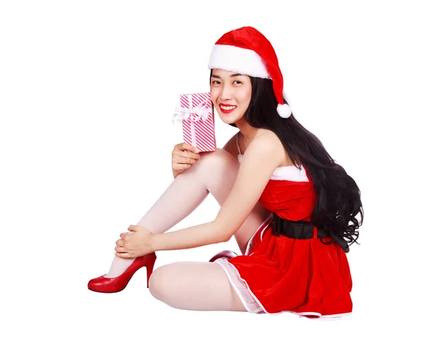Happy woman in Santa Claus clothes with gift box isolated on whi — Stock Photo, Image