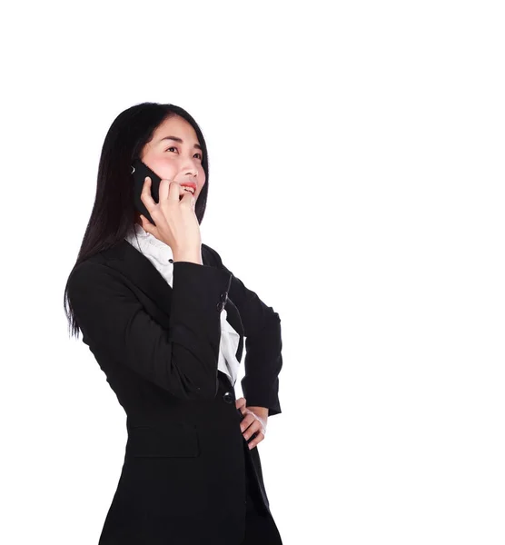 Mujer de negocios alegre en traje y hablando en un teléfono móvil —  Fotos de Stock