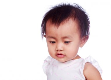Beyaz arka plan üzerinde izole bebek yüzü yukarı kapatın