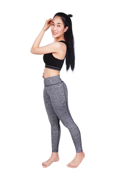 Portrait of smiling fitness young woman isolated on white backgr — Stock Photo, Image