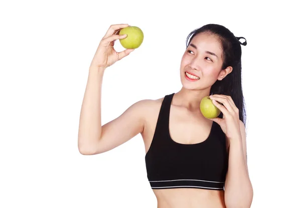 Fitness woman with green apple isolated on white background — Stock Photo, Image