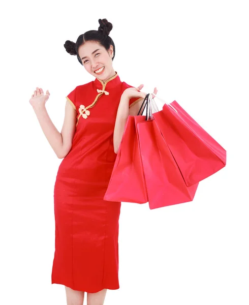 Woman holding shopping bag on chinese new year celebration isola — Stock Photo, Image