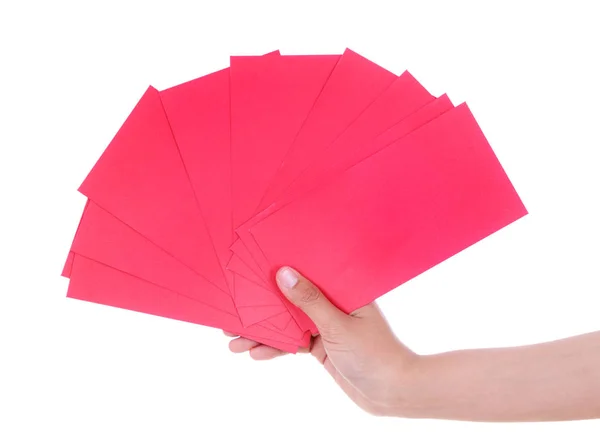 Hand holding red envelope in concept of happy chinese new year i — Stock Photo, Image