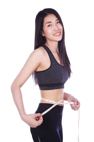 Vrouw taille meten met tape geïsoleerd op witte achtergrond — Stockfoto