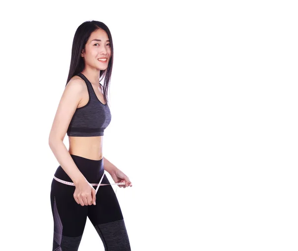 Mulher fitness com fita métrica em torno de seu pescoço isolado no whit — Fotografia de Stock