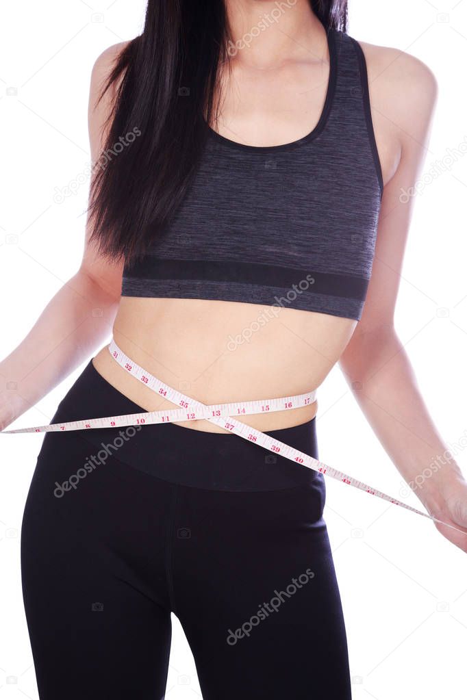 close up woman measuring waist with tape isolated on white 