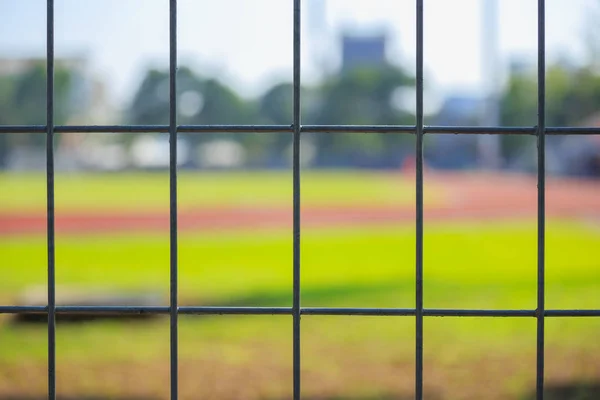 Drátěný plot fotbalové hřiště — Stock fotografie
