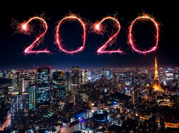 2020 Happy New Year fireworks over Tokyo cityscape at night, Jap