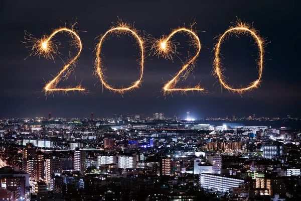 2020 Happy New Year fireworks over Tokyo cityscape at night, Jap