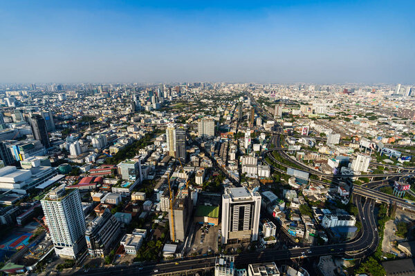 BANGKOK, THAILAND - 5 Dec 2019 : aerial view of Bangkok city downtown skyline and expressway road, view from Baiyoke Tower II in Bangkok, Thailand
