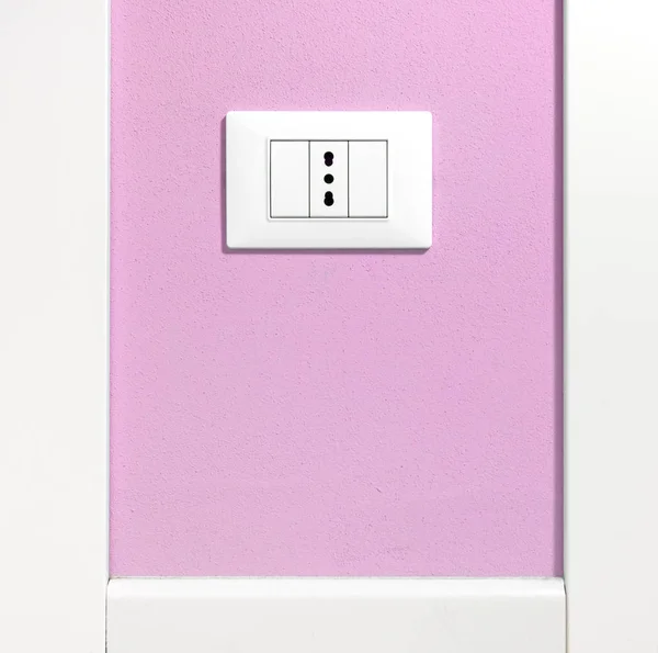Empty Wall Socket on a Purple Wall — Stock Photo, Image