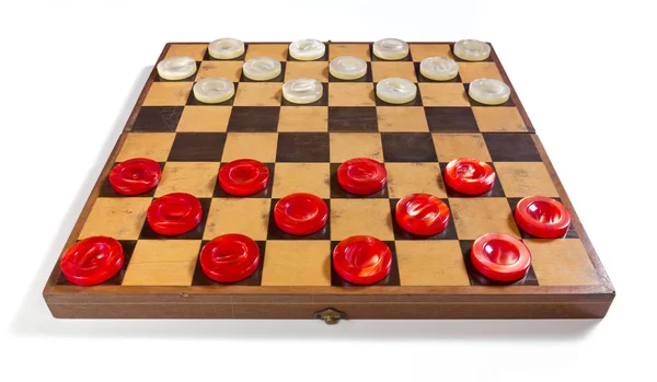 Checkerboard com peças vermelhas e brancas — Fotografia de Stock