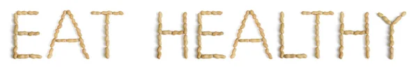 Frase escrita usando letras feitas com amendoim — Fotografia de Stock