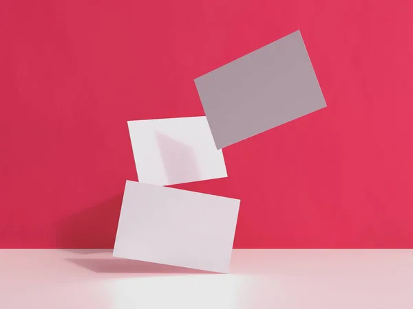 Renderizar imágenes 3D de tarjetas de visita dinámicamente dispersas sobre un fondo rosa . —  Fotos de Stock