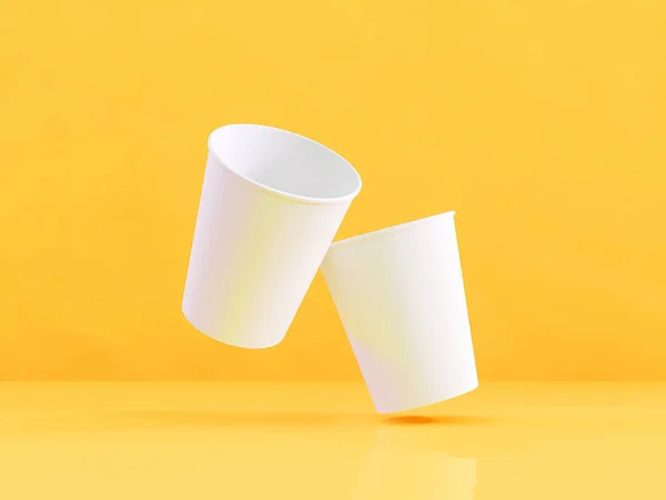 3D-model voor papier cups op het vliegtuig onder natuurlijke licht. Gele achtergrond. 3D-renderer. — Stockfoto