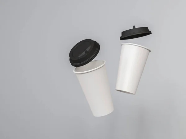 Modelo 3d de vasos de papel con una tapa de pie en un plano bajo luz natural. Fondo blanco. Representación . — Foto de Stock